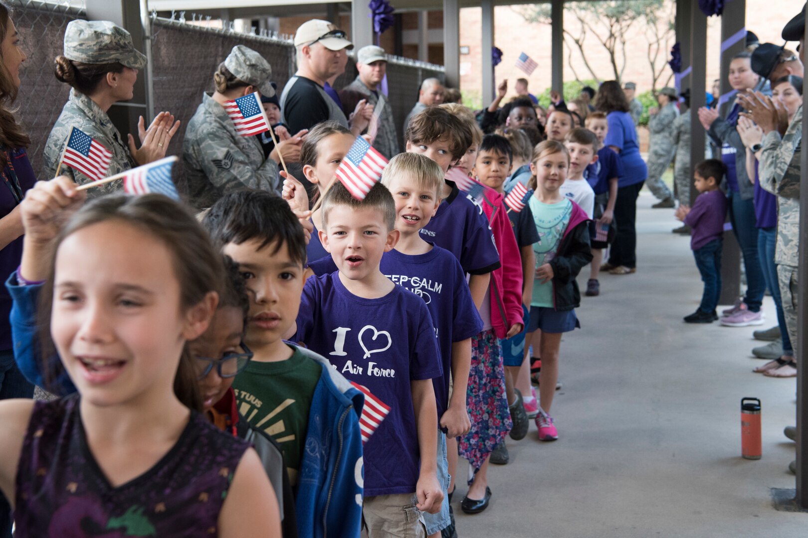 Students at Lackland Independent School District march in the PurpleUp! Parade April 12, 2019, at Joint Base San Antonio-Lackland, Texas.