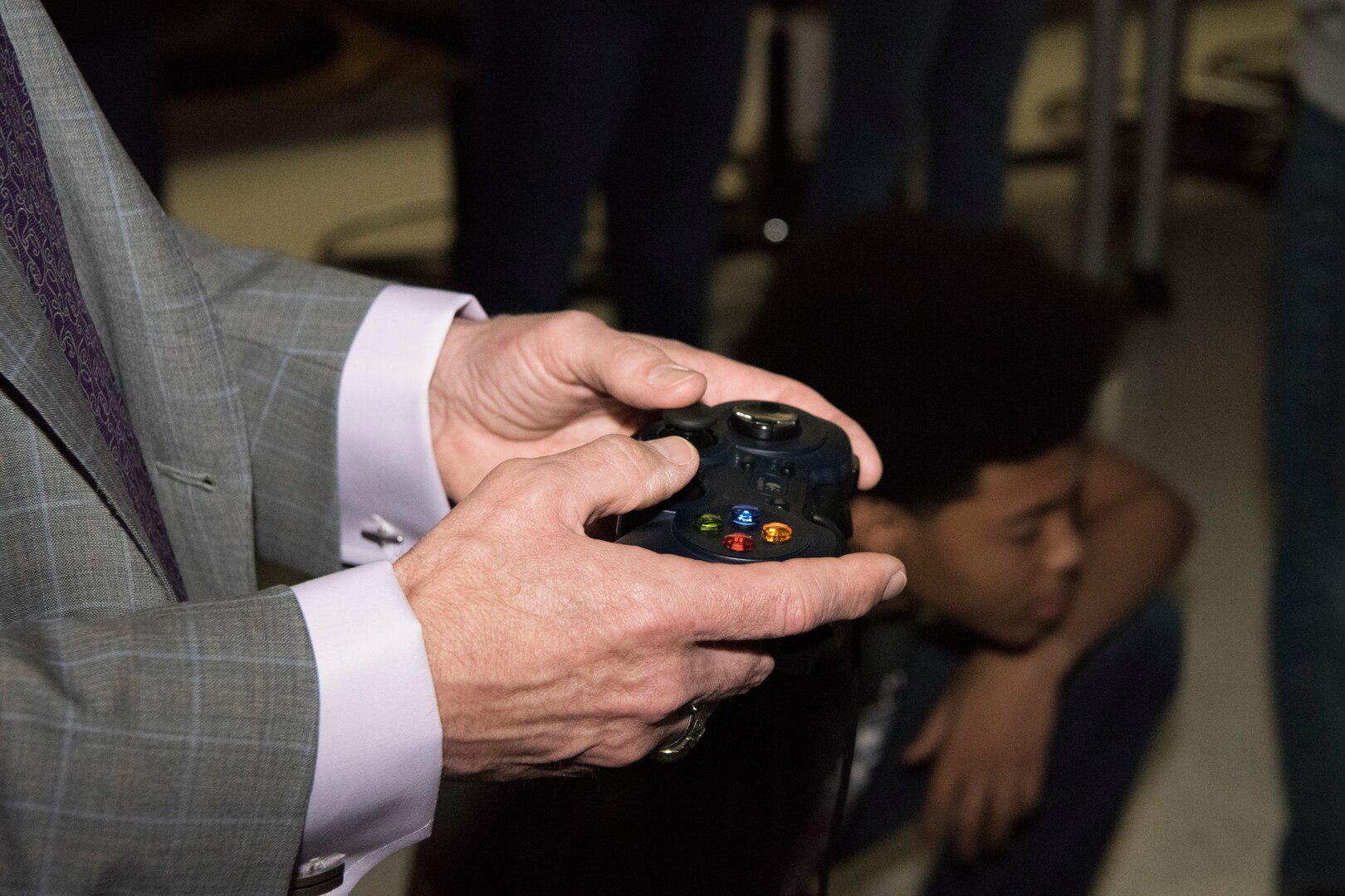 Frank Brogan, Department of Education assistant secretary for elementary and secondary education, visits Lackland Independent School District’s Bots in Blue and drives one of their robots April 12, 2019, at Joint Base San Antonio-Lackland, Texas.