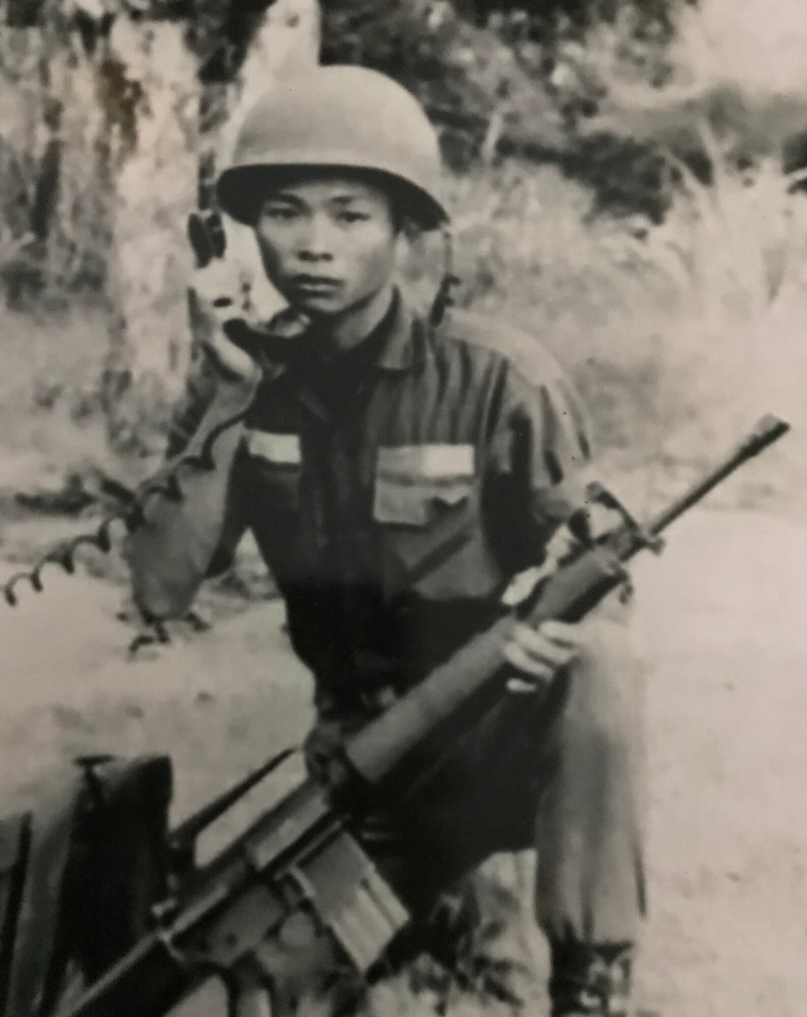 Chien Van Bui, an artilleryman in the South Vietnam army relays artillery rounds during the Vietnam War. His son, Lt. Col. Asan Bui, now serves as a communications flight commander in the U.S. Air Force Reserve’s 920th Rescue Wing based at Patrick Air Force Base, Florida. Coincidentally, Bui’s current unit can trace its roots back to the Vietnam War. (Courtesy photo)