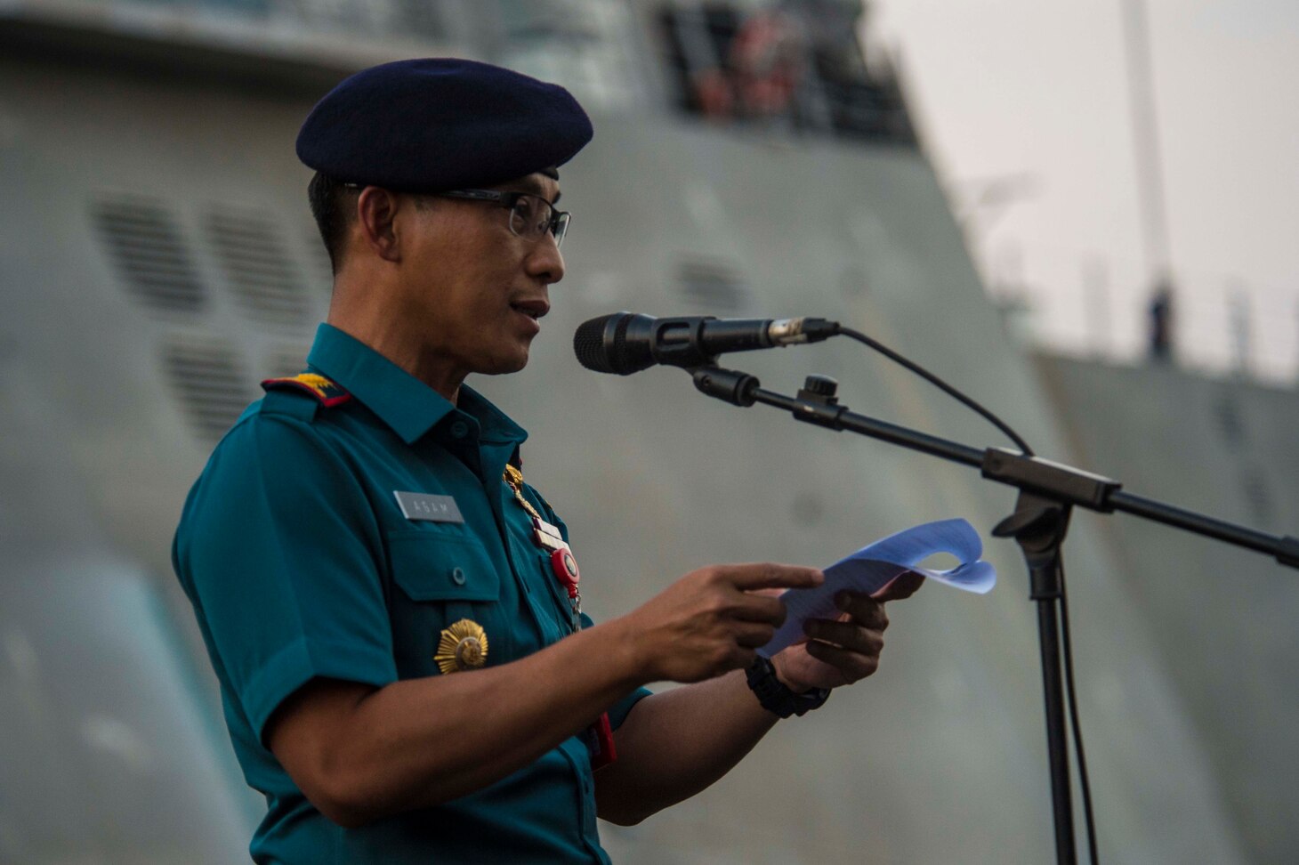 SURABAYA, Indonesia (July 31, 2019) Indonesian Col. Agam Endrasmoro, escort squadron commander of Naval Base Surabaya, provides his opening remarks during a welcoming ceremony for the Independence-variant littoral combat ship USS Montgomery (LCS 8) and the Legend-class cutter USCG Stratton (WMSL 752) after the two ships arrived in the port of Tanjung Perak for Cooperation Afloat Readiness and Training (CARAT) Indonesia 2019. CARAT, the U.S. Navy's longest running regional exercise in South and Southeast Asia, strengthens partnerships between regional navies and enhances maritime security cooperation throughout the Indo-Pacific.