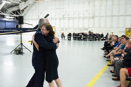 Air Force Gen. Paul J. Selva, vice chairman of the Joint Chiefs of Staff, embraces his wife Ricki during a retirement ceremony hosted by Marine Corps Gen. Joe Dunford, chairman of the Joint Chiefs of Staff, at Hanger 3, Joint Base Andrews, Md., July 31, 2019. Gen. Selva retires after over 39 years of service.