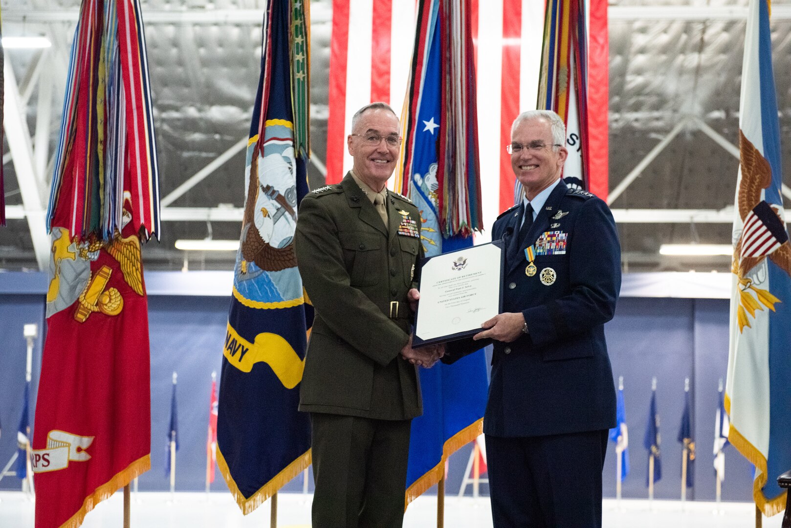 Air Force Gen. Paul J. Selva, vice chairman of the Joint Chiefs of Staff, poses with his Certificate of Retirement during the retirement ceremony hosted by Marine Corps Gen. Joe Dunford, chairman of the Joint Chiefs of Staff, at Hanger 3, Joint Base Andrews, Md., July 31, 2019. Gen. Selva retires after over 39 years of service.