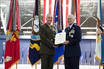 Air Force Gen. Paul J. Selva, vice chairman of the Joint Chiefs of Staff, poses with his Certificate of Retirement during the retirement ceremony hosted by Marine Corps Gen. Joe Dunford, chairman of the Joint Chiefs of Staff, at Hanger 3, Joint Base Andrews, Md., July 31, 2019. Gen. Selva retires after over 39 years of service.