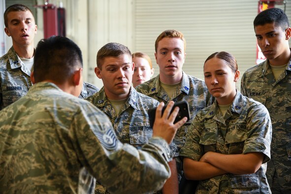 Air Force ROTC cadets watch a safety video during a tour of Hill Air Force Base, Utah, July 24, 2019. Over 80 cadets visited Hill as part of a professional development training program called Operation Air Force. The program gives cadets a greater understanding of the Air Force while introducing them to a variety of careers fields. (U.S. Air Force photo by R. Nial Bradshaw)