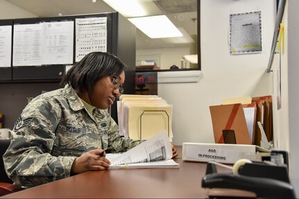 Air Force Staff Sgt. Lorena Royale, a personnel specialist with the Maryland National Guard’s Joint Force Headquarters, collects mail at the Fifth Regiment Armory in Baltimore, Maryland, for distribution to the Joint Forces Headquarters’ personnel office.