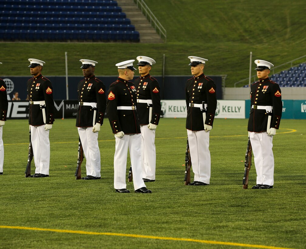 Marines with the U.S. Marine Corps Silent Drill Platoon execute their “rifle inspection” sequence at the Navy-Marine Corps Memorial Stadium, Annapolis, Maryland, July 27, 2019. The Silent Drill Platoon performed during halftime at the Major League Lacrosse All Star Game. (U.S. Marine Corps photo by Pfc. Allen Sanders)