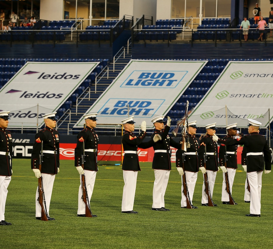 Marines with the U.S. Marine Corps Silent Drill Platoon execute their “rifle inspection” sequence at Navy-Marine Corps Memorial Stadium, Annapolis, Maryland, July 27, 2019. The Silent Drill Platoon performed during halftime at the Major League Lacrosse All Star Game. (U.S. Marine Corps photo by Pfc. Allen Sanders