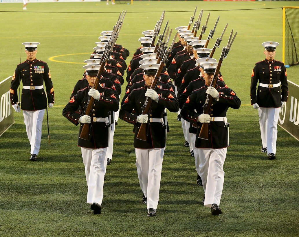Marines with the U.S. Marine Corps Silent Drill Platoon march off the field following their performance at Navy-Marine Corps Memorial Stadium, Annapolis, Maryland, July 27, 2019. The Silent Drill Platoon performed during halftime at the Major League Lacrosse All Star Game. (U.S. Marine Corps photo by Pfc. Allen Sanders)