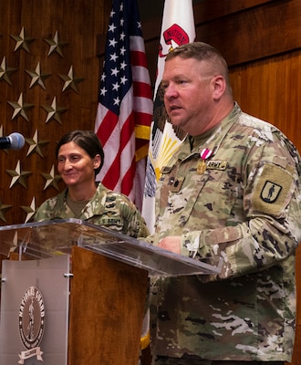 Lt. Col. Michael Hough thanks his friends and family who attended his retirement ceremony.