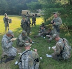 Soldiers assigned to Headquarters Company 642nd Aviation Support Battalion, New York Army National Guard, are enjoying the dinner meal during the field training exercise on July 27th as part of their Annual Training at Fort Indiantown Gap, PA.