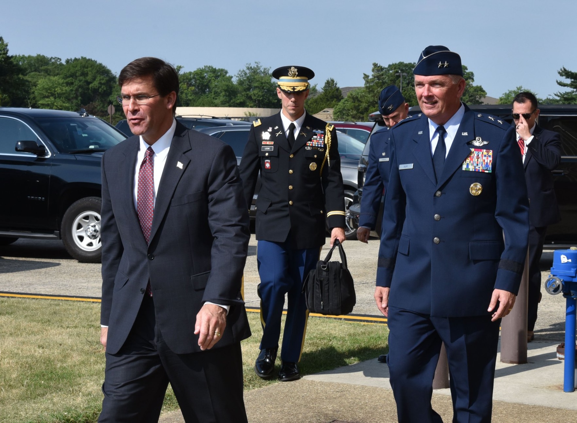 U.S. Secretary of Defense Dr. Mark T. Esper enters Joint Base Andrews Hangar 3 with Air Force District of Washington Commander Maj. Gen. Ricky N. Rupp to attend the retirement ceremony in honor of United States Air Force Gen. Paul J. Selva, Vice Chairman of the Joint Chiefs of Staff. Selva, the 10th Vice Chairman of The Joint Staff, retires from the Air Force after more than 39 years of honorable service. (U.S. Air Force photo/Master Sgt. Amaani Lyle)