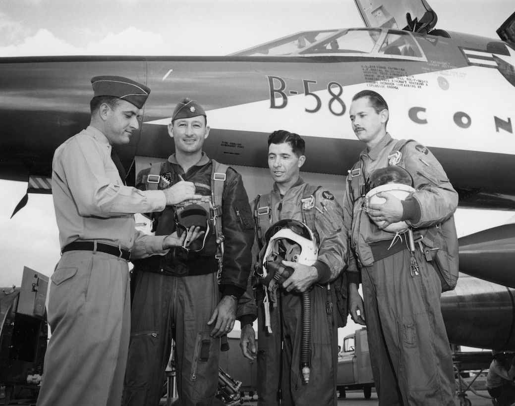 Lt. Johnny Armstrong (left) stands with his B-58 crewmates Maj. Fitz Fulton, Maj. Cliff Garrington and Everett Dunlap in front of the aircraft in 1957. Armstrong flew in this test and support aircraft making him the first non-rated U.S. Air Force officer to fly at Mach 2.