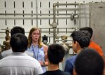 PHILADELPHIA (29 July 2019) Naval Surface Warfare Center, Philadelphia Division (NSWCPD) engineer Cassie Miller explains the Chilled Water Automation System (CWAS) test site during the annual Temple STEM Summer Camp. The summer camp provided local middle and high school students a chance to tour test sites and labs in the Command as well as engage in panel discussions featuring NSWCPD engineers. (U.S. Navy photo by Kirsten St. Peter)/Released
