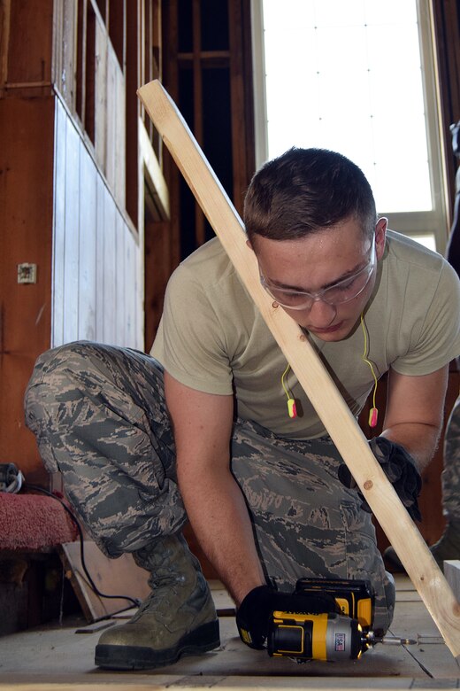 Airman 1st Class Paul Prohaszka, a carpenter with the 127th Civil Engineering Squadron out of Selfridge Air National Guard Base, Michigan,, builds a saw horse during a renovation project at Fort Indiantown Gap, Annville, Pennsylvania, on July 22, 2019.