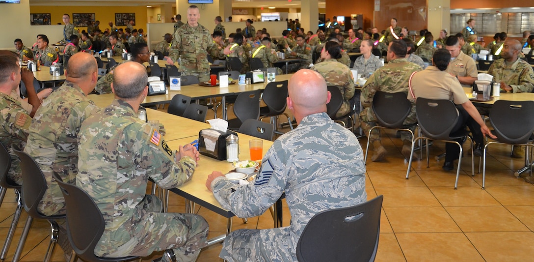 Command Sgt. Major John Wayne Troxell, senior enlisted advisor to the Chairman of the Joint Chiefs of Staff and the senior non-commissioned officer in the U.S. Armed Forces, ate lunch and engaged in constructive discussions with Army, Navy and Air Force METC instructors with the Medical Education and Training Campus during a visit to Joint Base San Antonio-Fort Sam Houston July 17.