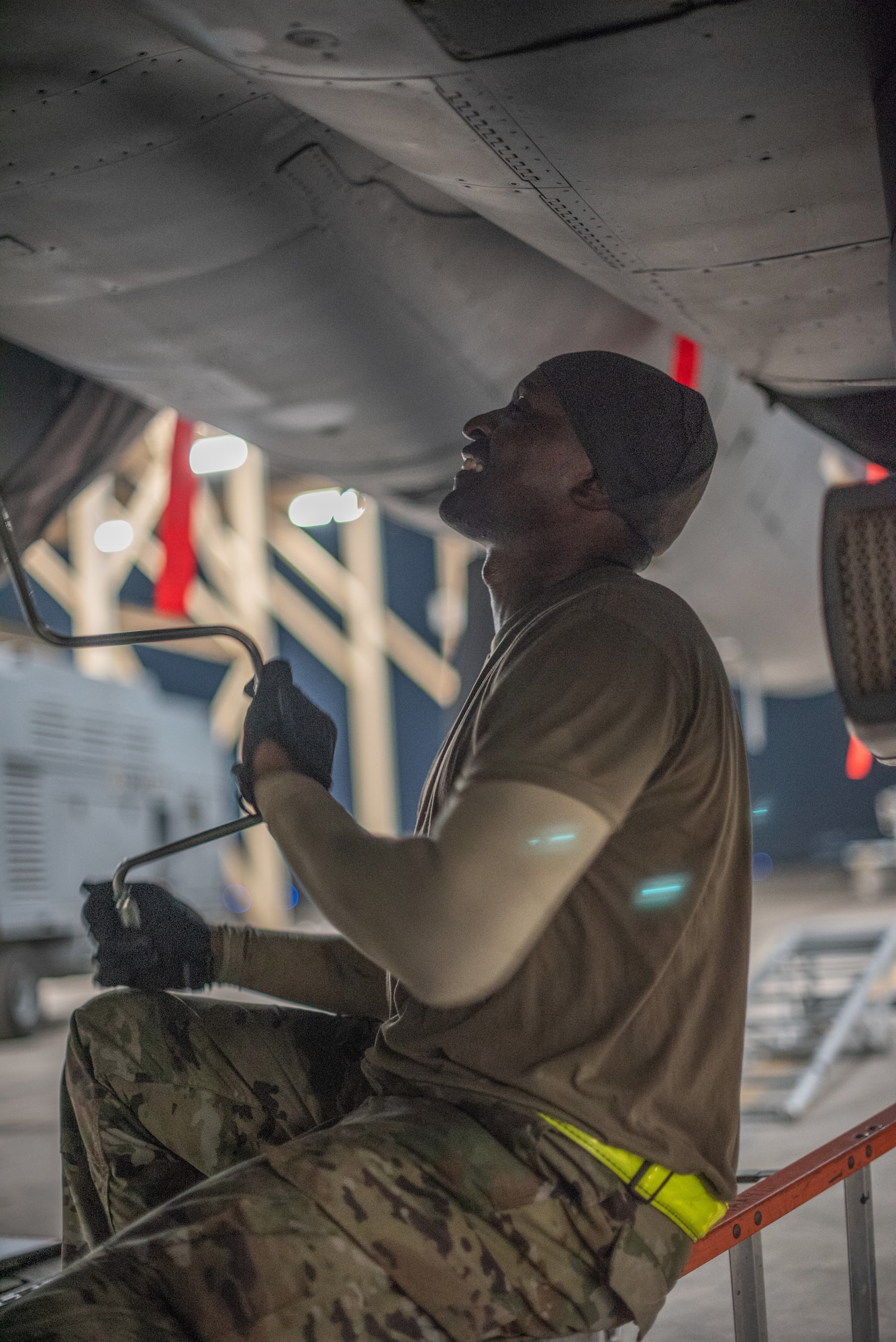 Staff Sgt. Kiefer May, 380th Expeditionary Aircraft Maintenance Squadron weapons load crew team chief, loads an F-15E Strike Eagle with 20mm high-explosive incendiary bullets July 15, 2019, at Al Dhafra Air Base, United Arab Emirates. Weapons load crews work 24/7 operations to support loading and configuring various munitions for the F-35A Lightning II, F-15E Strike Eagle and F-15C Eagle jets at ADAB. (U.S. Air Force photo by Staff Sgt. Chris Thornbury)