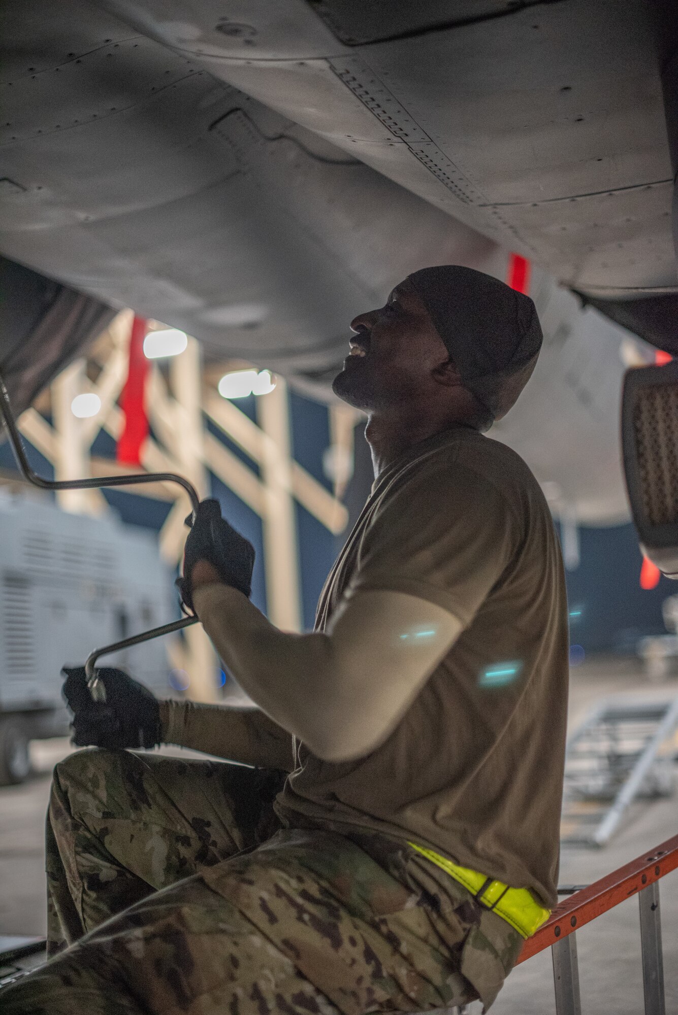 Staff Sgt. Kiefer May, 380th Expeditionary Aircraft Maintenance Squadron weapons load crew team chief, loads an F-15E Strike Eagle with 20mm high-explosive incendiary bullets July 15, 2019, at Al Dhafra Air Base, United Arab Emirates. Weapons load crews work 24/7 operations to support loading and configuring various munitions for the F-35A Lightning II, F-15E Strike Eagle and F-15C Eagle jets at ADAB. (U.S. Air Force photo by Staff Sgt. Chris Thornbury)