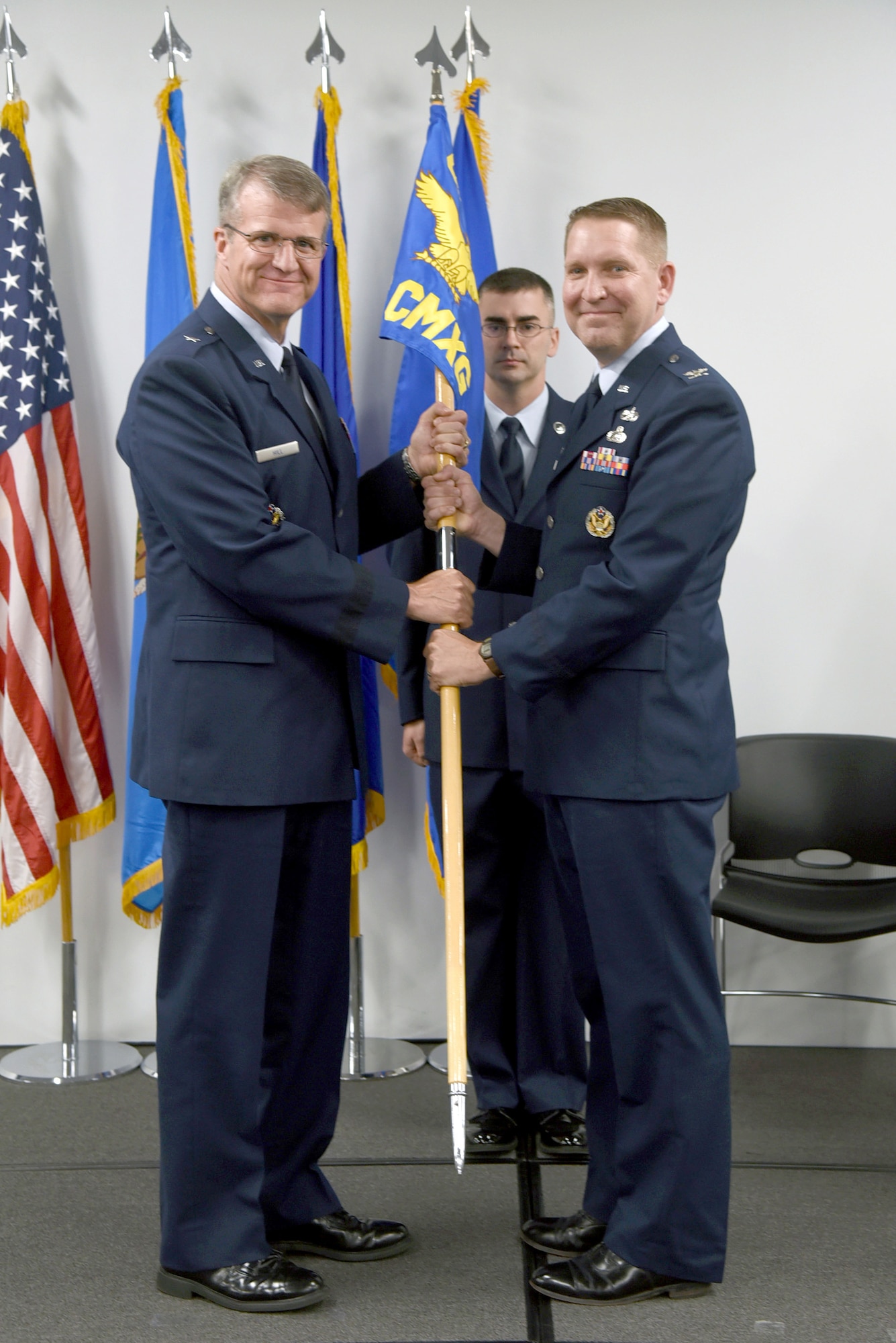 Oklahoma City Air Logistics Complex Commander Brig. Gen. Chris Hill presided over the Change of Command Ceremony for the 76th Commodities Maintenance Group in The Assembly room of Bldg. 9001 July 22. Col. Matthew Lewin assumed command of the group from Col. James Petrick. Lewin will be responsible for more than 2,000 maintenance professionals and 21 major production facilities providing manufacturing, repair, overhaul and testing of more than 75,000 aircraft and missile components. (U.S. Air Force photo/Kelly White)