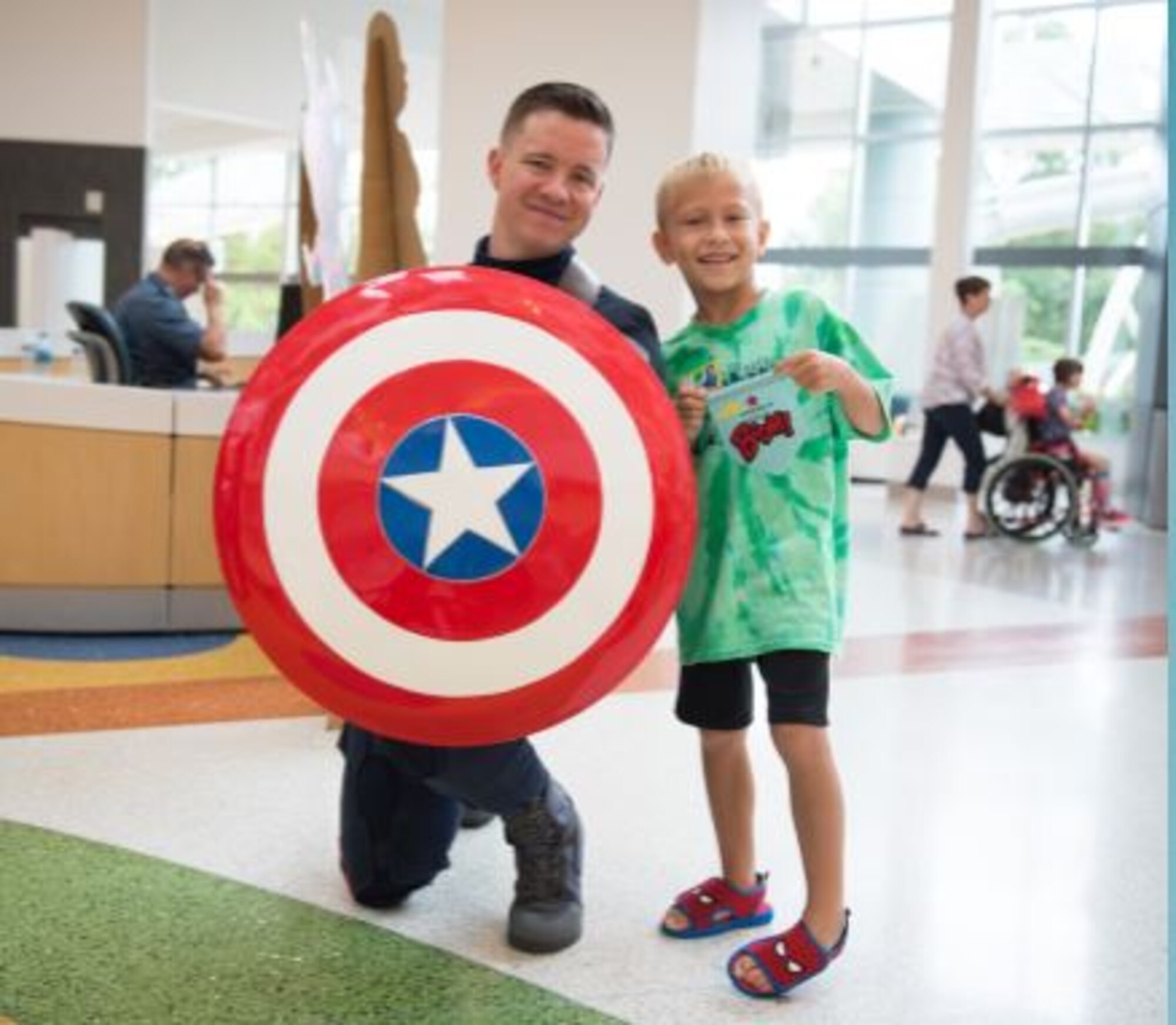 U.S. Air Force Tech. Sgt. Christopher Long, 87th Force Support Squadron base honor guard NCO in charge, volunteers to dress up as Captain America to give back to children and make them smile. (Courtesy photo)