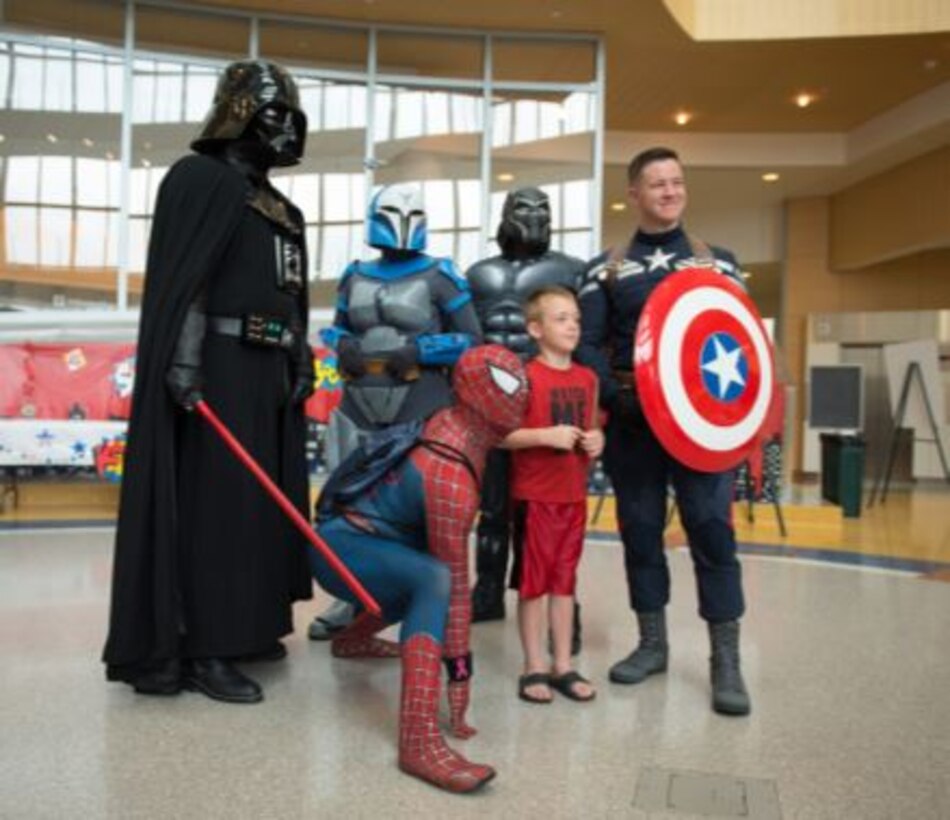 U.S. Air Force Tech. Sgt. Christopher Long, 87th Force Support Squadron base honor guard NCO in charge, volunteers to dress up as Captain America to give back to children and make them smile. (Courtesy photo)
