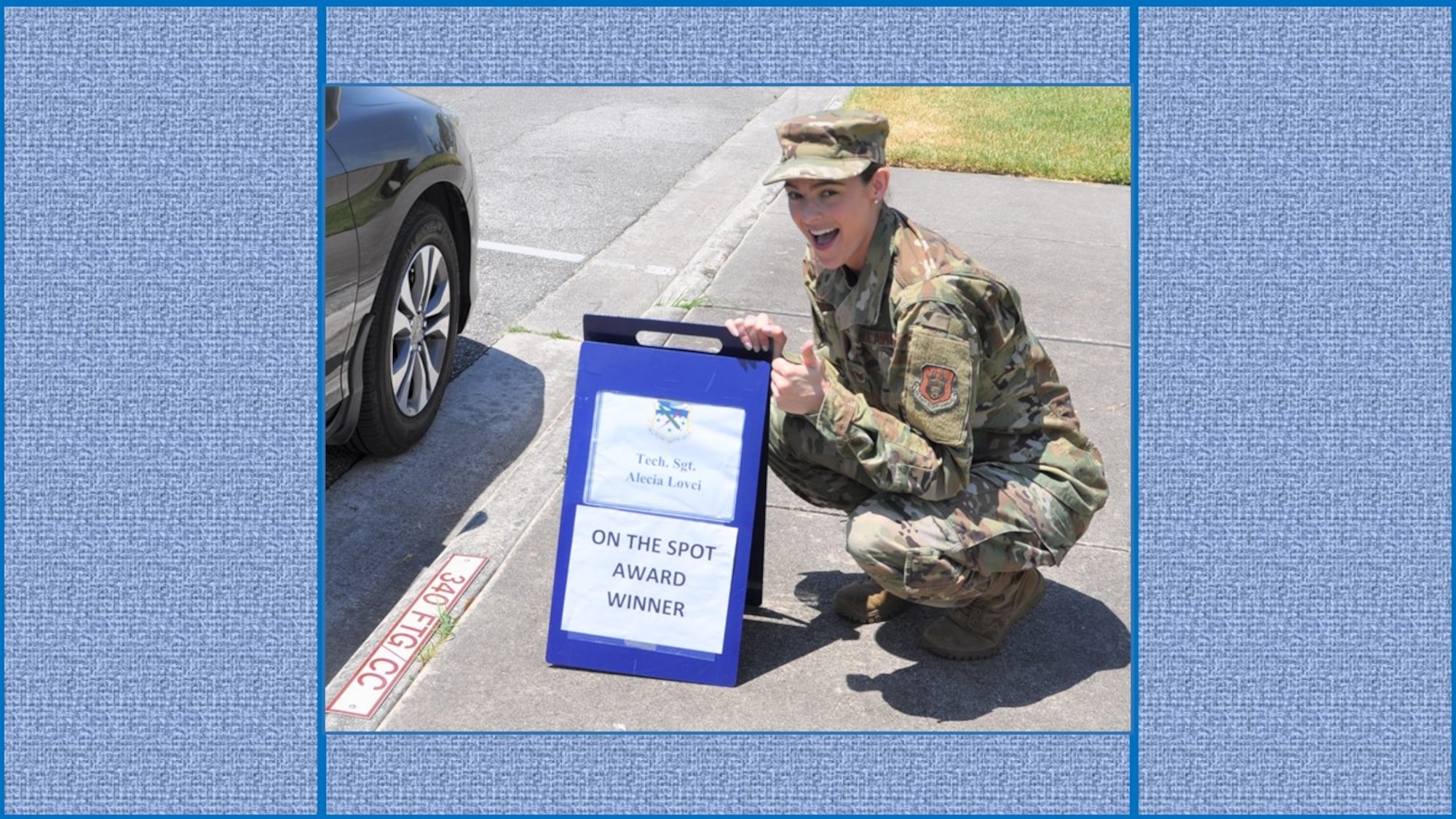 Tech. Sgt. Alecia Lovci, 340th Flying Training Group Undergraduate Flying Training program student administration specialist, claims her turn in the boss' parking slot following her selection as the July On-the-Spot Award winner. (U.S. Air Force photo by Janis El Shabazz)