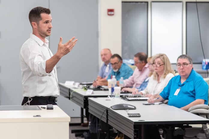 Kyle Shireman, a safety manager with the U.S. Army Engineering and Support Center, Huntsville, leads safety training in Huntsville, Alabama, July 24, 2019, for contractors who specialize in electronic security systems.