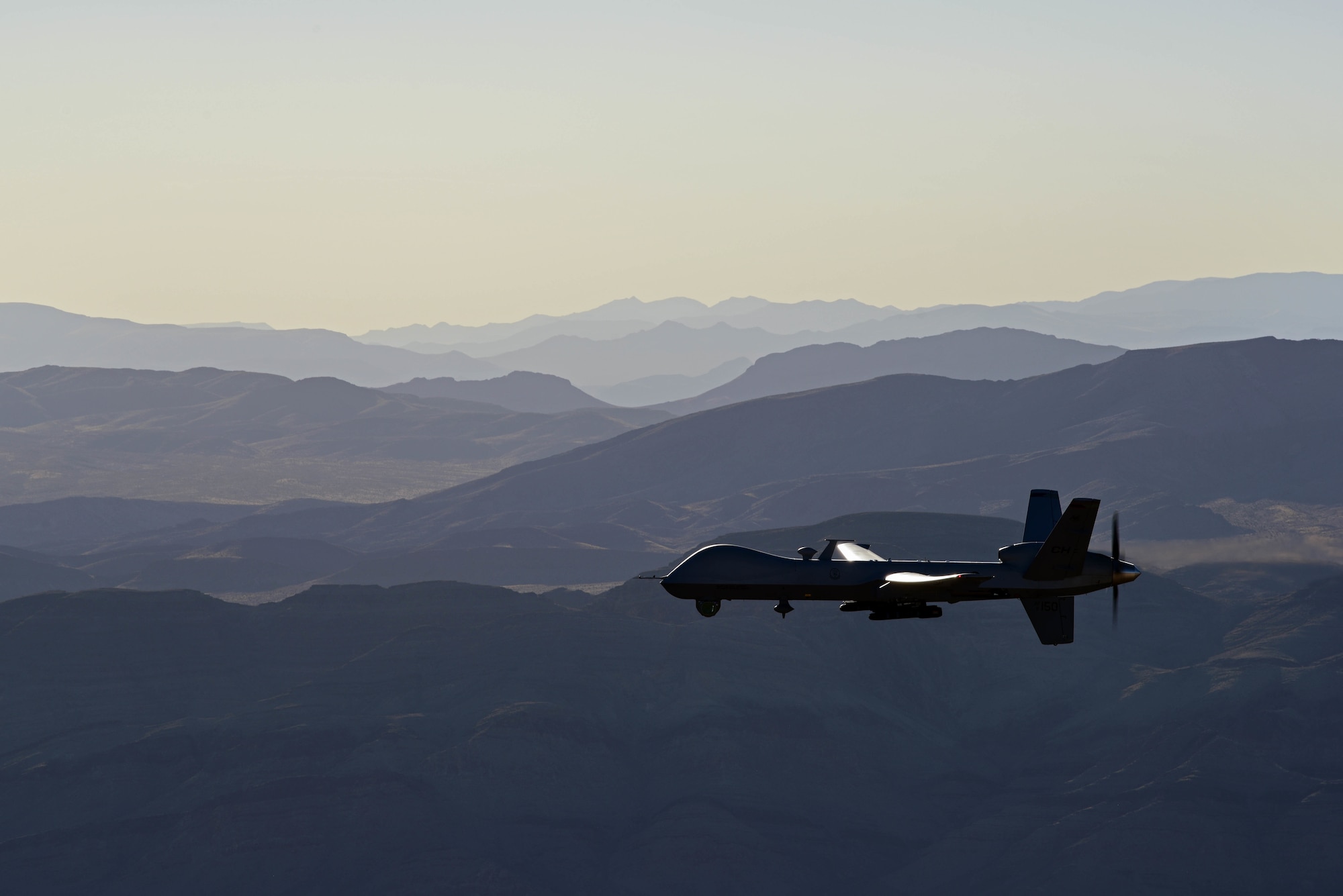 An MQ-9 Reaper flies over Training Range