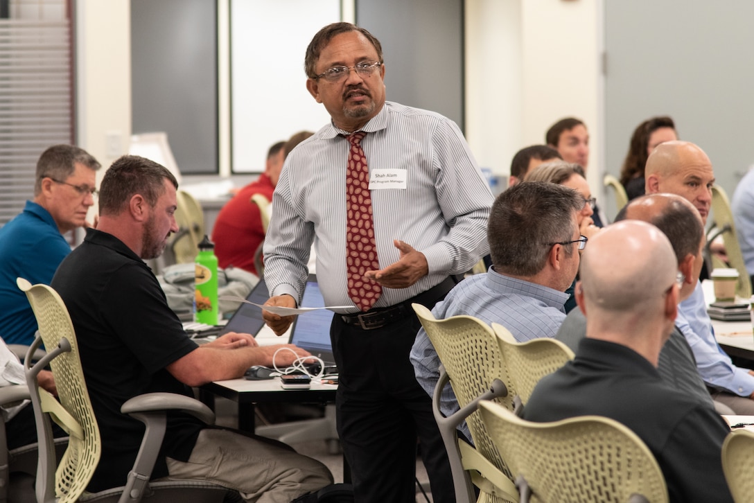 Shah Alam, Energy Savings Performance Contracting program manager with the U.S. Army Engineering and Support Center, Huntsville, covers introductions with a group of more than 70 contractors and government personnel attending a one-day joint workshop in Huntsville, Alabama, July 25, 2019. The group included representatives from the 13 energy-service companies that fall under Huntsville Center’s Energy Savings Performance Contracting Indefinite Delivery/Indefinite Quantity Multiple Award Task Order.