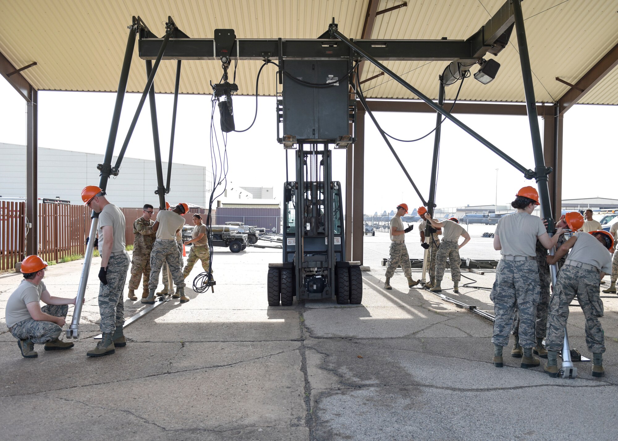 363rd Training Squadron munitions apprentice course students piece together a munitions assembly conveyor at Sheppard Air Force Base, Texas, August 1, 2019. The MAC can be assembled anywhere and is used during deployments to quickly build munitions. The MAC's speed and effectiveness is key to mission success during wartime operations. (U.S. Air Force photo by Senior Airman Ilyana A. Escalona)