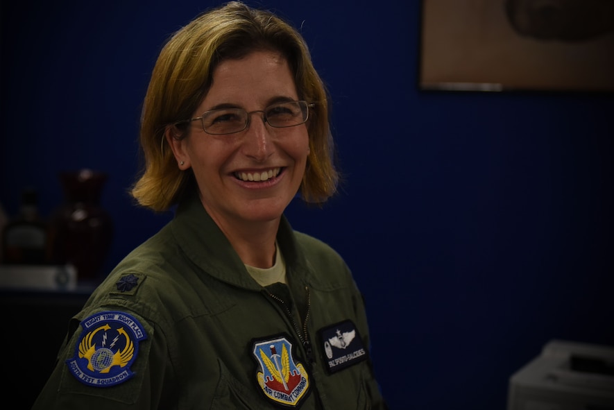 Lt. Col. “Spaz” Sposito-Salceies, 505th Test Squadron (TS) commander, stands behind her desk July 26, 2019, at Nellis Air Force Base, Nev.