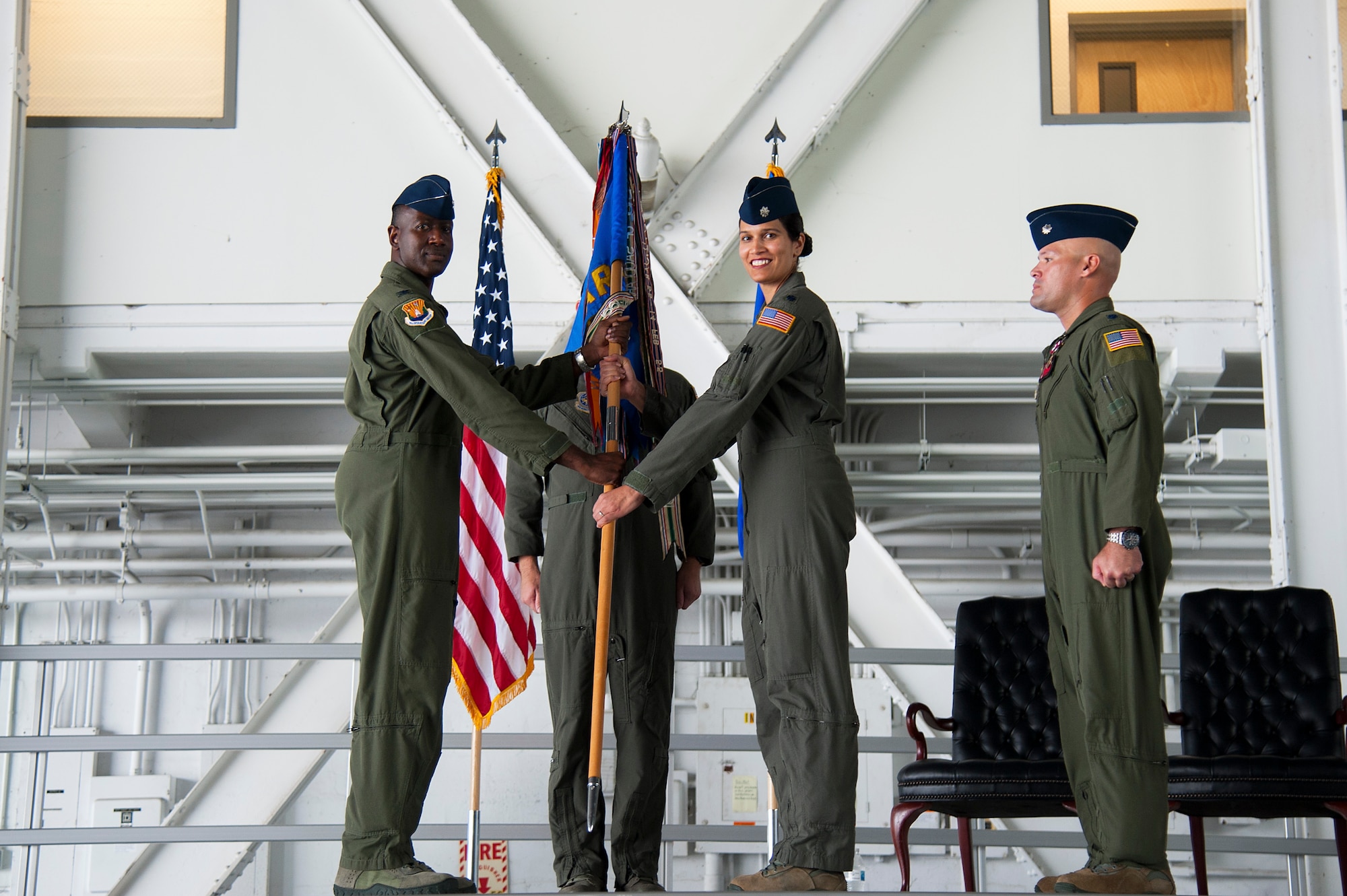 U.S. Air Force Lt. Col. Menola Guthrie, the 50th ARS commander, accepts the guidon from Col. Travis Edwards, the 6th Operations Group commander during a change of command ceremony, Aug. 2, 2019, at MacDill Air Force Base, Fla. Guthrie’s appointment as the 50th ARS commander, marks her second command assignment, having previously served as the 28th Expeditionary Air Refueling Squadron commander, at Al Udeid Air Base, Qatar from April 2018 to August 2018. (U.S. Air Force photo by Airman 1st Class Shannon Bowman)
