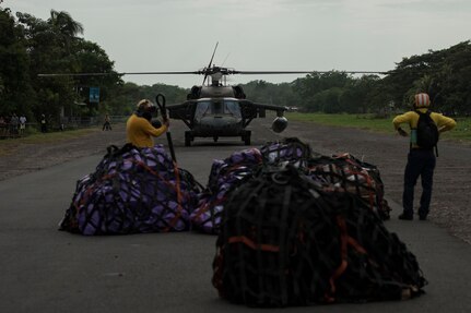 A UH-60 Blackhawk assigned to the 1st Battalion, 228th Aviation Regiment spin prepares to return equipment and mail to the U.S.N.S. Comfort July 23, 2019, at Punta Arenas, Costa Rica.  Pilots and aircrew assigned to the 1st Battalion, 228th Aviation transported personnel and equipment to allow the U.S. Naval Ship Comfort to provide medical care to Costa Rican citizens and Venezuelan migrants as part of the United States enduring promise of helping its southern neighbors. The Winged Warriors transported more than 470 people and 20 tons of cargo from July 21 - 30. (U.S. Air Force photo by Staff Sgt. Eric Summers Jr.)