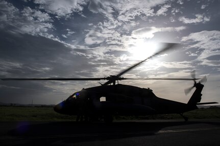 A UH-60 Blackhawk, assigned to the 1st Battalion, 228th Aviation Regiment, shuts down after completing a day of sling loading equipment and transporting personnel on the U.S.N.S. Comfort, July 23, 2019, at Liberia, Costa Rica.  Pilots and aircrew assigned to the 1st Battalion, 228th Aviation transported personnel and equipment to allow the U.S. Naval Ship Comfort to provide medical care to Costa Rican citizens and Venezuelan migrants as part of the United States enduring promise of helping its southern neighbors. The Winged Warriors transported more than 470 people and 20 tons of cargo from July 21 - 30. (U.S. Air Force photo by Staff Sgt. Eric Summers Jr.)