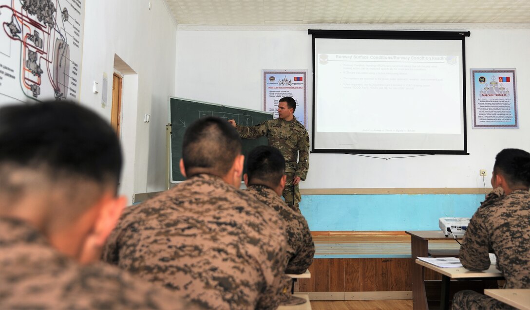 U.S. Air Force Master Sgt. Mark Hoover, 36th Contingency Response Support Squadron air advisor, shares his expertise on runway conditions during a subject-matter expert exchange, July 24, 2019 in Ulaanbaatar, Mongolia as part of Pacific Angel 2019.