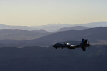 Creech and Nellis Airmen coordinated a training flight together on the Nevada Test and Training Range, July 15, 2019. Aircrew with the 66th Rescue Squadron conducted training exercises and integrated with the MQ-9 Reaper aircrew to document the Reaper in flight. (U.S. Air Force photo by Senior Airman Haley Stevens)