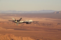 An MQ-9 Reaper flies a training mission over the Nevada Test and Training Range, July 15, 2019. The Reaper and its aircrew are considered one of the most demanded aircraft in combat operations due to its ability to provide oversight, gather intelligence and employ munitions on the battlefield for 18-20 hours at a time. (U.S. Air Force photo by Staff Sgt. James Thompson)