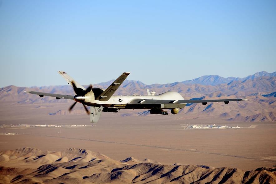 An MQ-9 Reaper flies a training mission over the Nevada Test and Training Range, July 15, 2019. MQ-9 aircrew provide dominant, persistent attack and reconnaissance for comabtant commanders and coalition partners across the globe. (U.S. Air Force photo by Airman 1st Class William Rio Rosado)