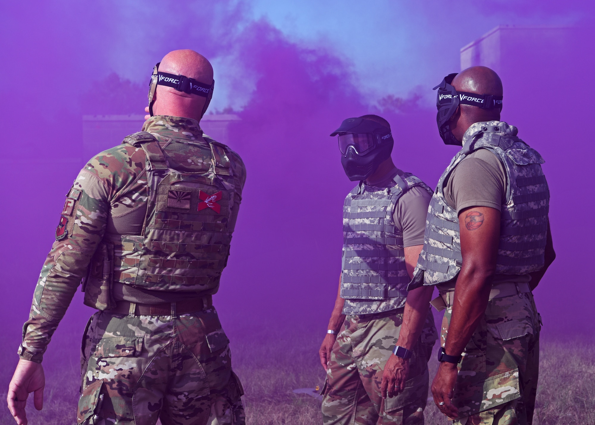 U.S. Air Force Tech. Sgt. Mark Karas, noncommissioned officer in charge at the 17th Security Forces Squadron (left) shows Chief Master Sgt. Manuel Piñeiro, U.S. Air Force first sergeant (center) and Chief Master Sergeant of the Air Force Kaleth O. Wright a simulated firefight during a Warrior Ancillary Specialized Training Program course at Goodfellow Air Force Base, Texas, August 2, 2019. Goodfellow AFB has quarterly WASP courses and has trained over 700 wing personnel to date. (U.S. Air Force photo by Airman 1st Class Ethan Sherwood/Released)