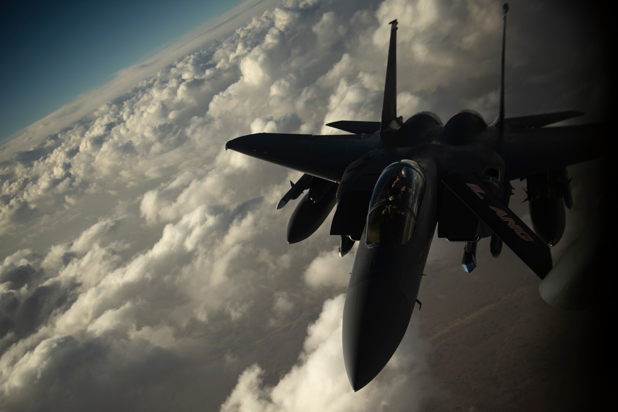 An F-15E Strike Eagle receives fuel from a KC-135 Stratotanker from the 28th Expeditionary Air Refueling Squadron, May 7, 2019, at an undisclosed location. The 28th EARS maintains constant presence in the U.S. Air Forces Central Command area of responsibility, supporting U.S. and Coalition aircraft in various operations conducted in countries such as Iraq, Syria, and Afghanistan. (U.S. Air Force photo by Master Sergeant Russ Scalf)