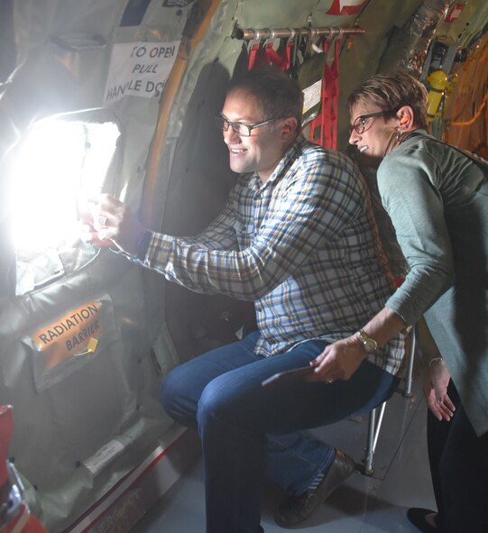 (Left to right) Chris Hearne, Textron Aviation Senior Vice President of Engineering, and Cheryl Toms, Hearne’s assistant, take pictures of an A-10 Thunderbolts from 442nd Fighter Wing at Whiteman AFB, Mo., during a "Bosslift" sponsored by the local Employer Support of the Guard and Reserve, Aug. 3, 2019.  The flight was also an example of how highly the 931 ARW values its relationships with their Reservists’ employers, especially when it comes to the challenges associated with Reserve service.