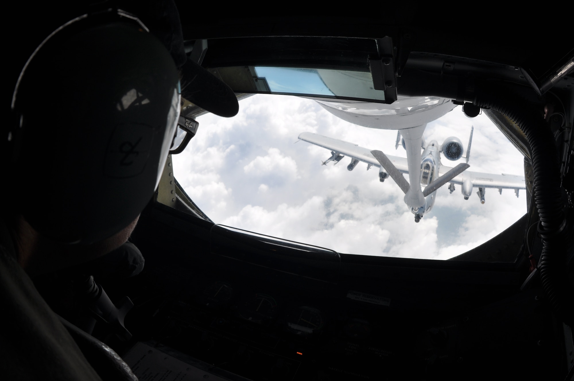 Chief Master Sgt. Kathy Lowman, 18th Air Refueling Wing Squadron boom operator, refuels an -10 Thunderbolts from the 442nd Fighter Wing at Whiteman AFB, Mo., during a during a "Bosslift" sponsored by the local Employer Support of the Guard and Reserve, Aug. 3, 2019.  During the flight, ten civilian employers of 931st Air Refueling Wing Traditional Reservists observed the aerial refueling of the A-10s by a 931st Air Refueling Wing aircrew.