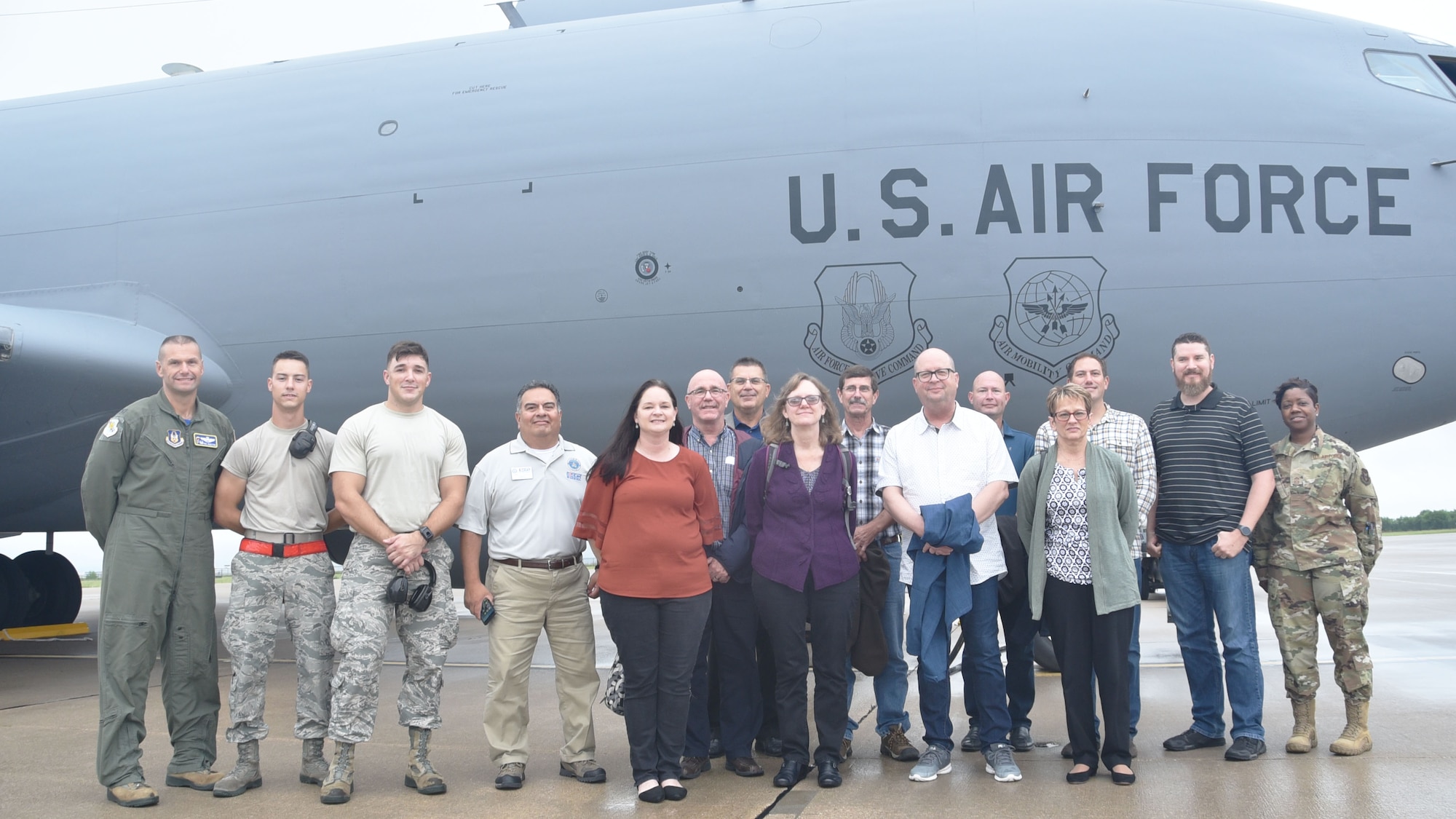 Ten civilian employers of 931st Air Refueling Wing Airmen pose for a photo before boarding a KC-135 Stratotanker during a "Bosslift" sponsored by the local Employer Support of the Guard and Reserve (ESGR) here, Aug. 3, 2019, McConnell Air Force Base, Kan.  According to the official ESGR website, the purpose of ESGR is to educate supervisors and managers of traditional Reservists and develop a greater appreciation for the service of citizen Airmen. The focus of the organization is to promote an understanding of both the National Guard and Reserve as well as encourage support of employers in development of human resource policies and practices that support an employee's participation in the military.