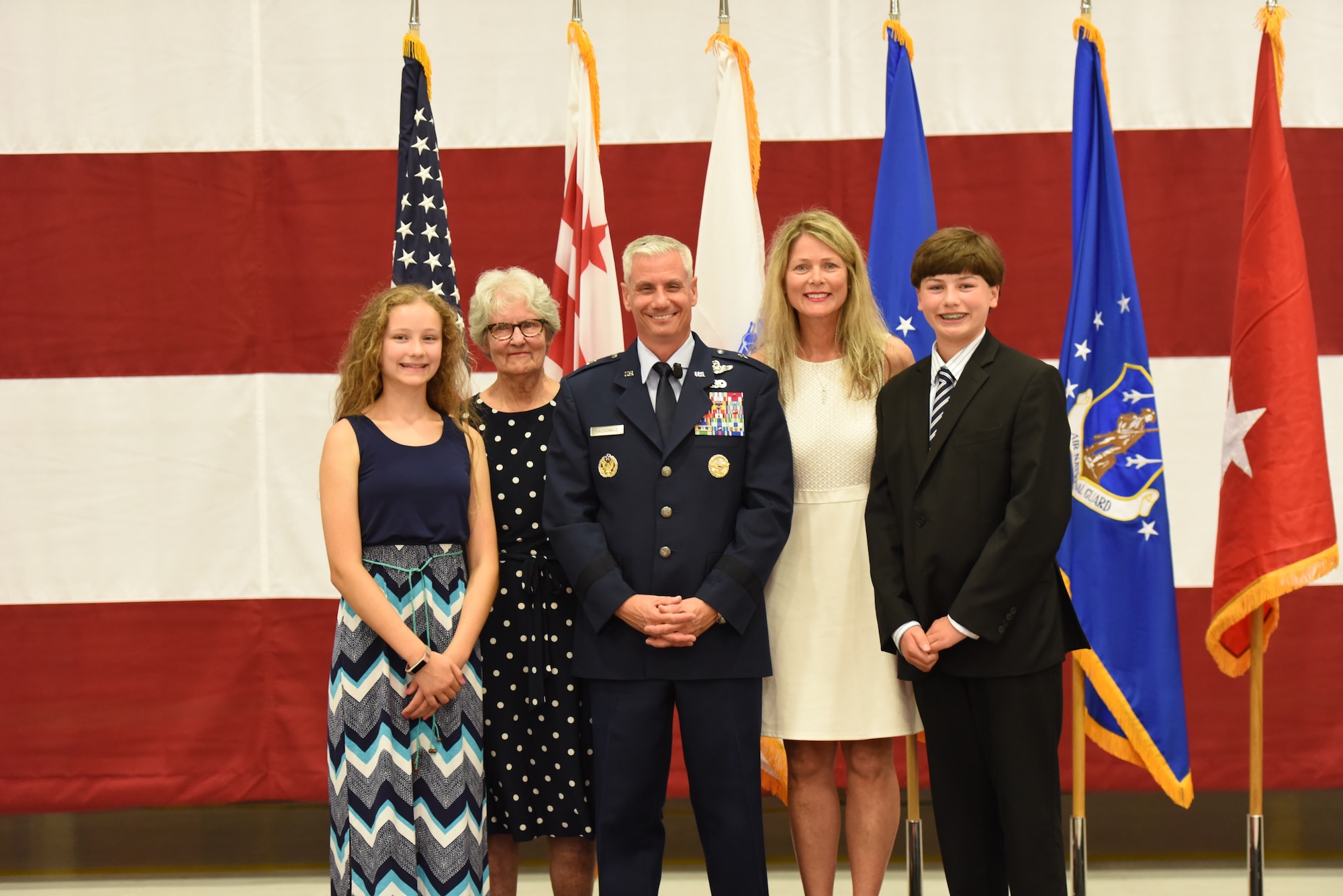 Brig. Gen. Keith G. MacDonald, commander, 113th Wing, District of Columbia National Guard, poses with his family after being promoted to brigadier general August 4, 2019 at Joint Base Andrews, Md. (Air National Guard photo by Senior Master Sgt. Craig Clapper)