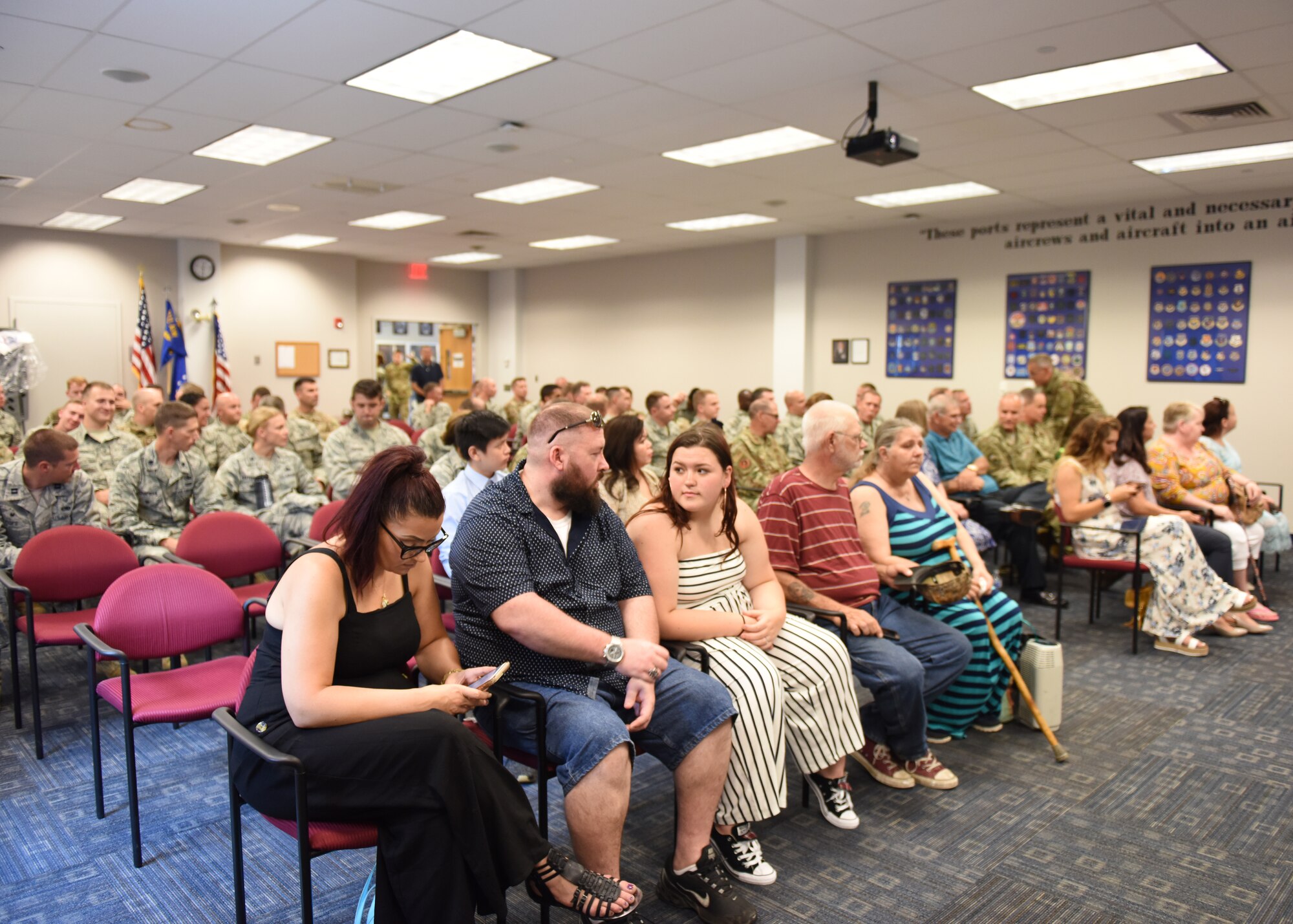 Airmen from the 911th Aircraft Maintenance Squadron, as well as family and friends of Capt. Joseph E. Walters, commander of the 911th Aircraft Maintenance Squadron, attend an assumption of command ceremony at the Pittsburgh International Airport Air Reserve Station, Pennsylvania Aug. 3, 2019.