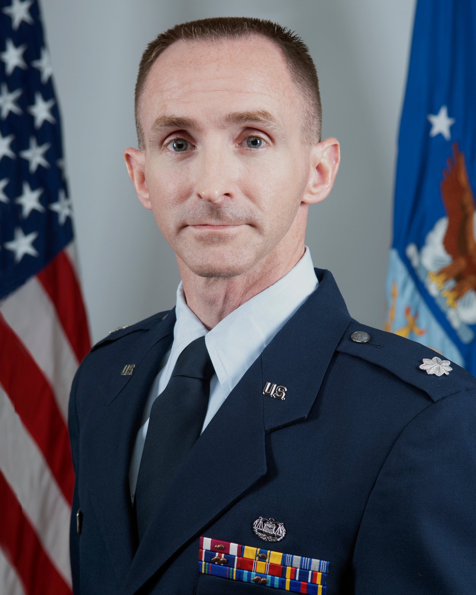 Lt. Col. Flannery, 434th Air Refueling Wing staff judge advocate, poses for an official portrait at Grissom Air Reserve Base, Ind.