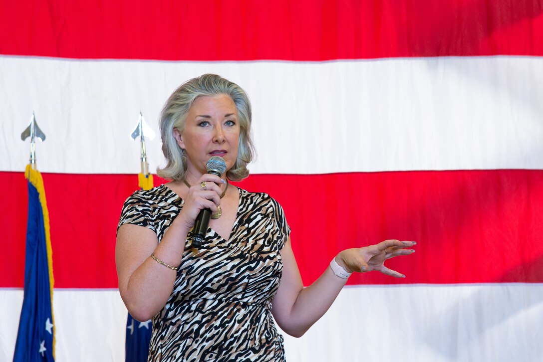 Alma Mohr, the 302nd Airlift Wing director of psychological health, teaches wing members about using mindfulness to build resiliency during a commander’s call Aug. 3, 2019 at Peterson Air Force Base, Colorado. This commander’s call was part of the 302nd AW’s Resiliency Tactical Pause, which was directed by the chief of staff of the Air Force in response to the increased number of suicides across the total force. (U.S. Air Force photo by Staff Sgt. Heather Heiney)