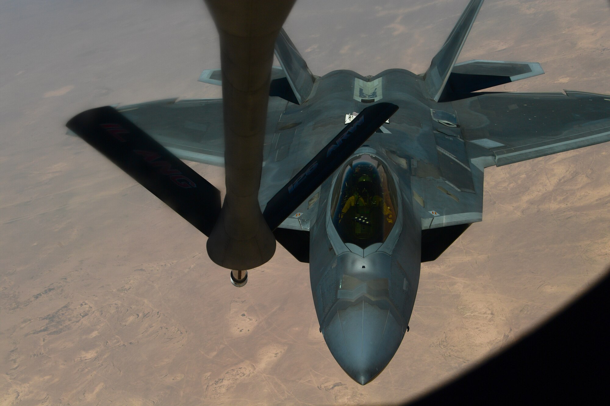 A photo of an F-22 preparing to receive fuel from a KC-135