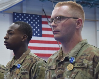 Pvt.1st Class Terry Brown of Albany, Georgia, and Pfc. Caleb Bennett of Rockmart, Georgia, were among the Soldiers recognized with an Army Achievement Medal during a battle handoff ceremony at Fort Stewart. Brown, of the Cumming-based 420th Signal Company and Bennett of the Statesboro-based Georgia Southern Cadet Detachment were the honor graduates of their basic combat training classes.