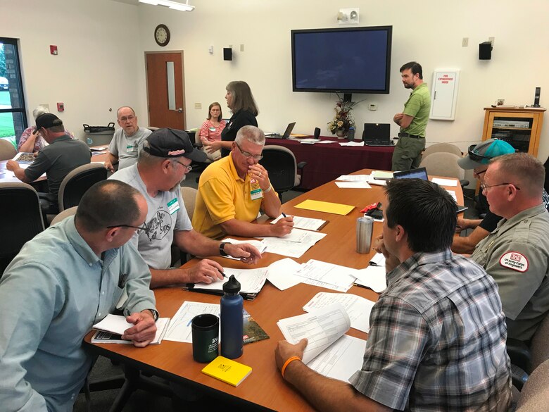 A group of Kansas City District subject matter experts met with members of the Stockton Lake community July 31, 2019 to practice what would need to happen if an unusual significant flooding or dam failure event happened there.