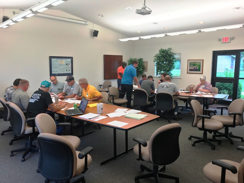 A group of Kansas City District subject matter experts met with members of the Stockton Lake community July 31, 2019 to practice what would need to happen if an unusual significant flooding or dam failure event happened there.